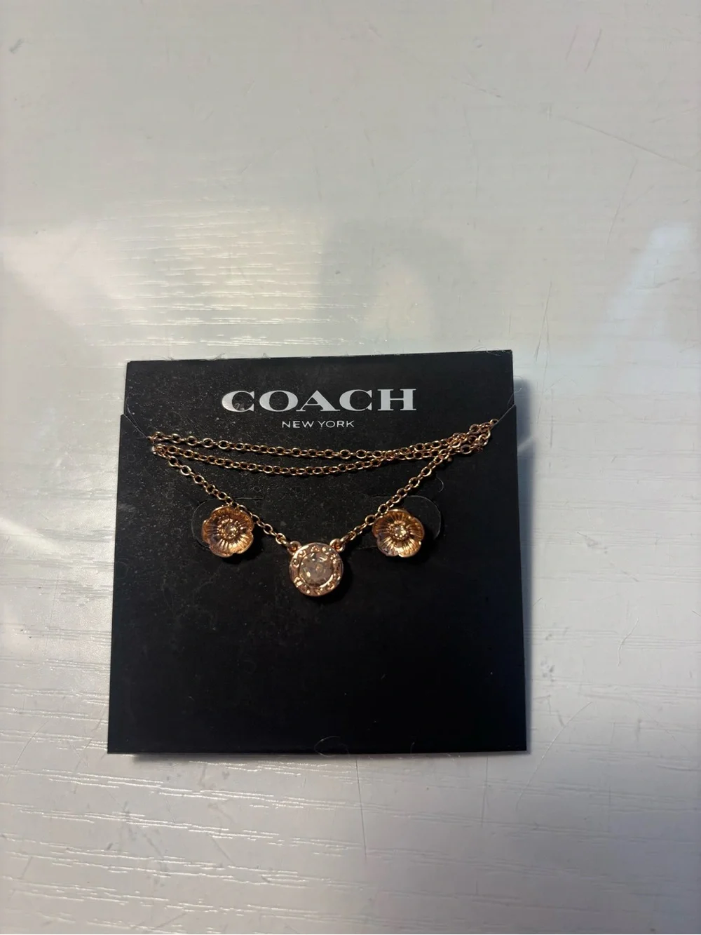 Coach Rose Gold Flower Pendant Necklace with earrings set.